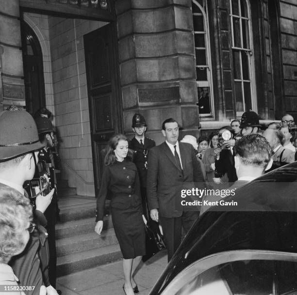 British showgirl and model, Christine Keeler leaving Marlborough Street Magistrates Court, where she is on trial for perjury and conspiring to...