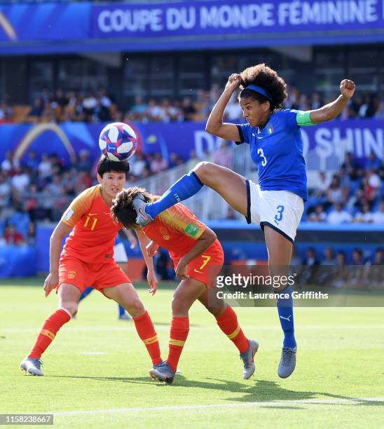 Shuang Wang of China collides with Sara Gama of Italy during the 2019 FIFA Women's World Cup France Round Of 16 match between Italy and China at...