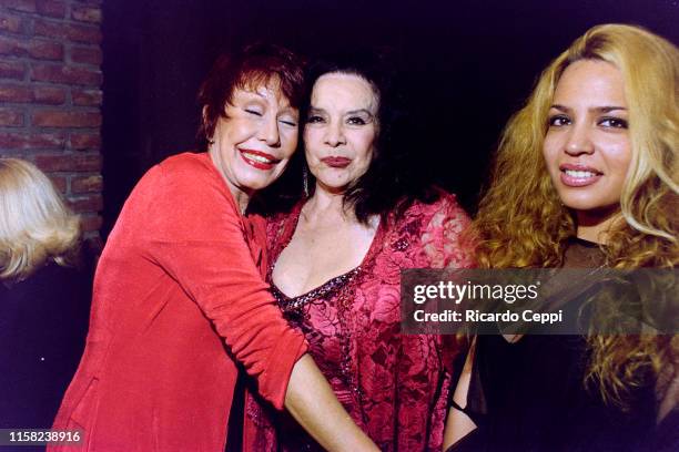 Gladys del Valle Rojo 'Gogó Rojo' Castro and Argentine actress Isabel Sarli attends the 'Gogó' inauguration party on March 23, 2004 in Buenos Aires,...