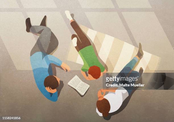 family relaxing, reading book - family stock illustrations
