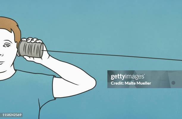 man listening in tin can telephone - communication problems stock illustrations