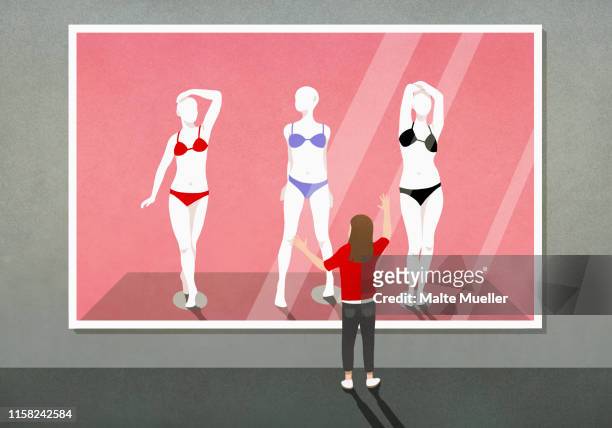 girl looking at bikinis on mannequins photograph in art gallery - kids swimsuit models 幅插畫檔、美工圖案、卡通及圖標