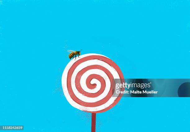 fly on pinwheel lollipop - sugar food 幅插畫檔、美工圖案、卡通及圖標