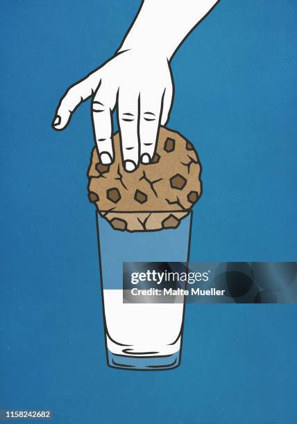 hand trying to dip large cookie into glass of milk - zu groß stock-grafiken, -clipart, -cartoons und -symbole