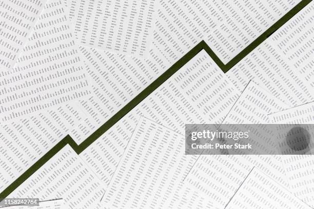 view from above ascending line graph through paper - graph paper bildbanksfoton och bilder