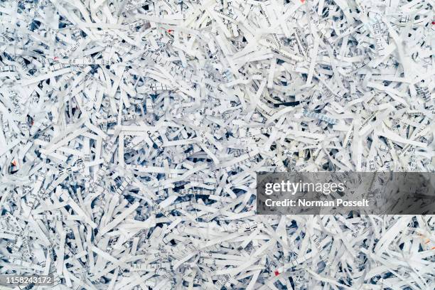 shredded paper background - shredded stockfoto's en -beelden