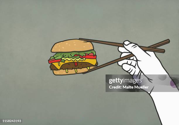 man eating cheeseburger with chopsticks - bizarre stock-grafiken, -clipart, -cartoons und -symbole