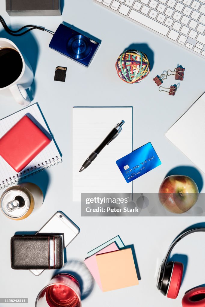 View from above credit card and office supplies on desk