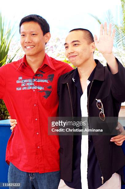 Sakada Kaewbuadee and Apichatpong Weerasethakul during 2004 Cannes Film Festival - "Tropical Malady" - Photocall at Palais Du Festival in Cannes,...