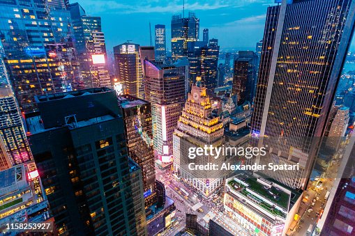 Times Square aerial view at night with illuminated skyscrapers, New York, USA Times Square aerial view at night with illuminated skyscrapers, New York, USA