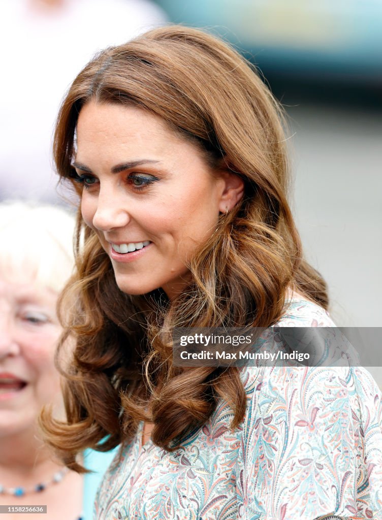 The Duchess Of Cambridge Joins Photography Workshop With Action For Children
