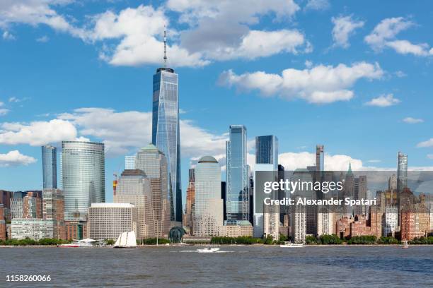 downtown manhattan skyscrapers and hudson river on a sunny day, new york, usa - one world trade center view stock pictures, royalty-free photos & images