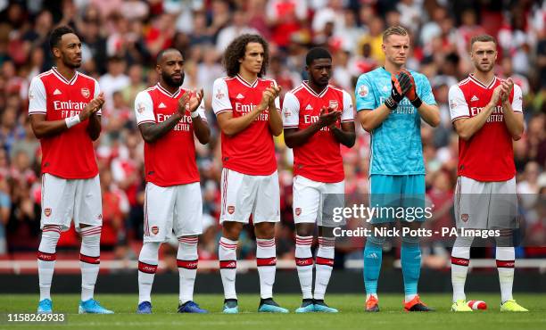 Arsenal's Pierre-Emerick Aubameyang, Alexandre Lacazette, Matteo Guendouzi, Ainsley Maitland-Niles, Bernd Leno, Calum Chambers during a minute's...
