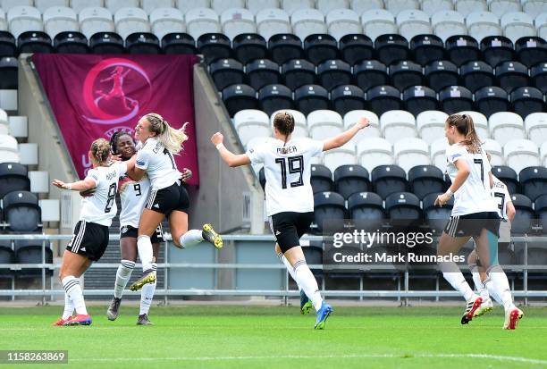 Nicole Anyomi of Germany celebrates with her team mates after scoring the opening goal of the game during the UEFA Women's Under19 European...