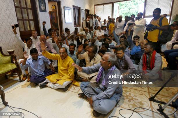 Auto Rickshaw drivers gather to listen to the Prime Ministers Mann Ki Baat and join the Bharatiya Janata Party as a part of an ongoing membership...