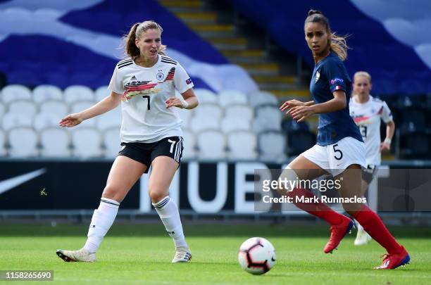 Melissa Kossler of Germany is challenges by Maelle Lakrar of France during the UEFA Women's Under19 European Championship Final between France...