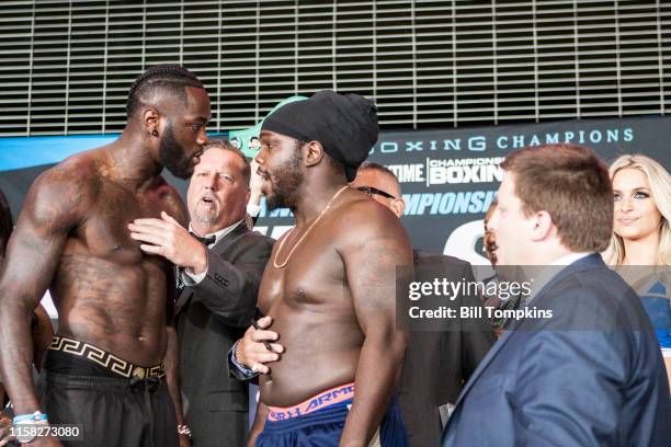 November 3: Deontay Wilder and Bermane Stiverne faceoff during the weigh-in for their upcoming Heavyweight fight. Barclay Center. November 3, 2017 in...