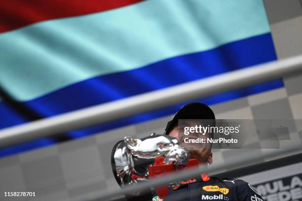 Dutch driver Max Verstappen of Austrian Anglo team Aston Martin Red Bull Racing under the podium and in podium ceremony during the 78th edition of...