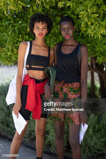 Guests are seen on the street attending 080 Barcelona Fashion week on June 25, 2019 in Barcelona, Spain.