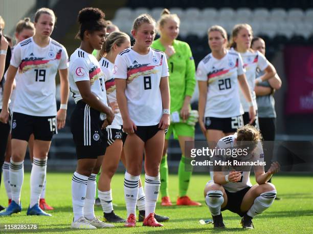 The Germany Women's U19 squad wait to pick up their runners up medals after losing to France 2-1 in the UEFA Women's Under19 European Championship...