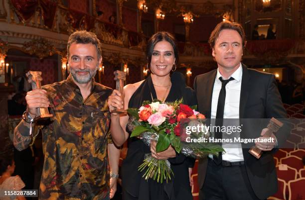 Director Talal Derki, Nadine Labaki and Michael Bully Herbig during the Bernhard Wicki Award during the Munich Film Festival 2019 at Cuvilles Theatre...