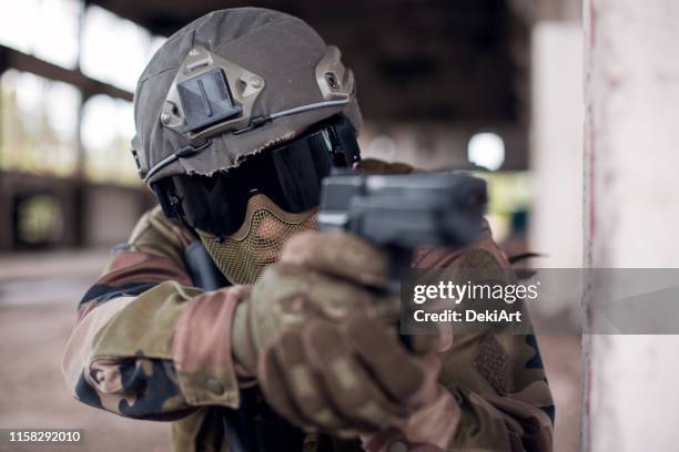special forces soldier - airsoft pistol stock pictures, royalty-free photos & images