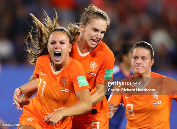 Lieke Martens of the Netherlands celebrates with teammates after scoring her team's second goal during the 2019 FIFA Women's World Cup France Round...