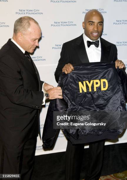 Police Commissioner Raymond W. Kelly and Tiki Barber attend The 30th Annual New York City Police Foundation Gala March 11, 2008 at the Waldorf...