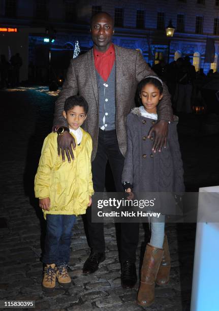 Fashion designer Ozwald Boateng and family attend the VIP opening of Skate hosted by Tiffany and Co held at Somerset House on November 16, 2009 in...