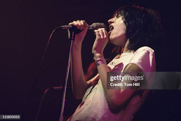 Singer-songwriter-poet Patti Smith performs at Alex Cooley's Electric Ballroom on January 23, 1976 in Atlanta, Georgia.