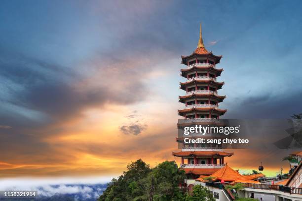 view of chin swee caves temple pagoda in the sunset - stock photo - kuala lumpur landscape stock pictures, royalty-free photos & images