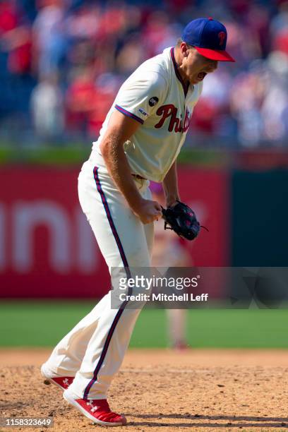 Nick Pivetta of the Philadelphia Phillies reacts after striking out Charlie Culberson of the Atlanta Braves , to end the game at Citizens Bank Park...