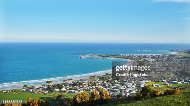 ocean road seaside scenery in australia - driving car australia road copy space sunlight travel destinations colour image day getting stock pictures, royalty-free photos & images