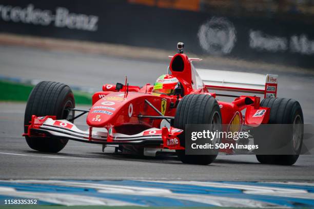 German F2 driver Mick Schumacher drives Ferrari F2004 of his father Michael Schumacher prior to the start of the German F1 Grand Prix.