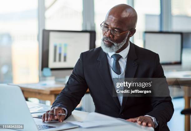 he's always a busy man - senior businessman stock pictures, royalty-free photos & images