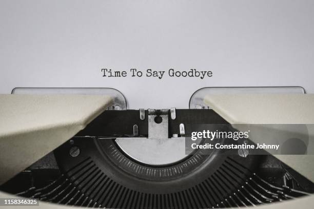 typewriter close up view with quote - time to say goodbye - creative storytelling stock pictures, royalty-free photos & images