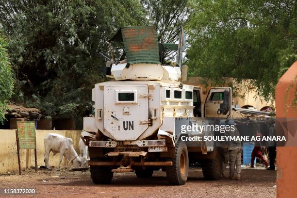 Senegalese soldiers of the UN peacekeeping mission in Mali MINUSMA patrol in the streets of Gao, on July 24 a day after suicide bombers in a vehicle...