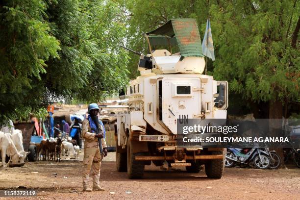 Senegalese soldier of the UN peacekeeping mission in Mali MINUSMA patrols in the streets of Gao, on July 24 a day after suicide bombers in a vehicle...