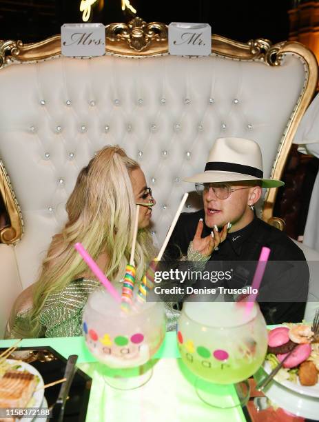 Tana Mongeau and Jake Paul celebrate at their wedding reception at Sweet Beginnings in Sugar Factory In Las Vegas on July 28, 2019 in Las Vegas,...