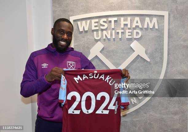 Arthur Masuaku of West Ham United signs a contract extension until 2024 at Rush Green Training Ground on July 29, 2019 in Romford, England.