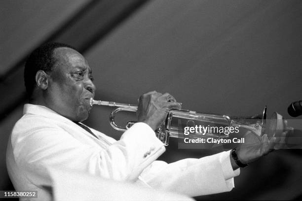 Dave Bartholomew performs with his orchestra at the New Orleans Jazz & Heritage Festival on May 1, 1994.