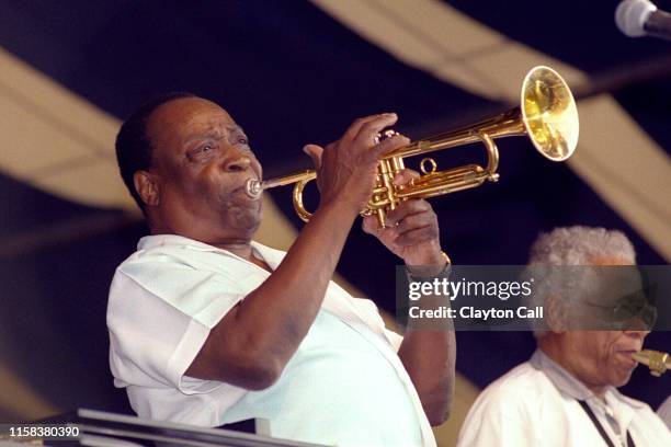 Dave Bartholomew performs with Fats Domino at the New Orleans Jazz & Heritage Festival on April 25, 1999. : Dave Bartholomew, Herb Hardesty