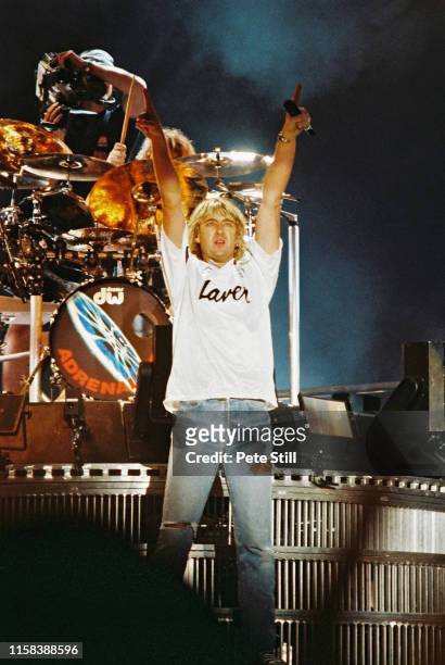 Drummer Rick Allen and Joe Elliott of Def Leppard perform on stage at The Don Valley Stadium, on June 6th, 1993 in Sheffield, England.