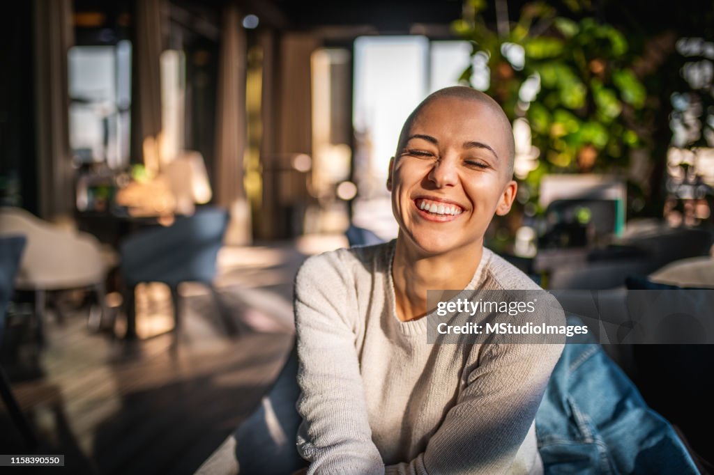 Portrait of a smiling girl with short hair