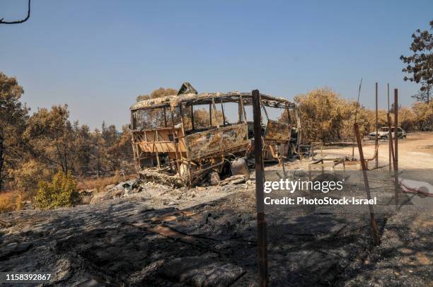 remains of a burnt car - forest fire house stock pictures, royalty-free photos & images