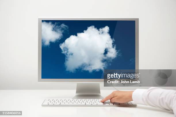 cloud computing desk. - office minimalist stock pictures, royalty-free photos & images