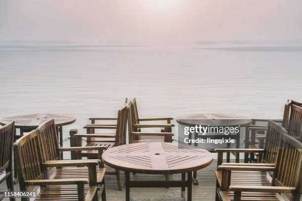 china west lake open-air cafe - waterfront cafe stock pictures, royalty-free photos & images