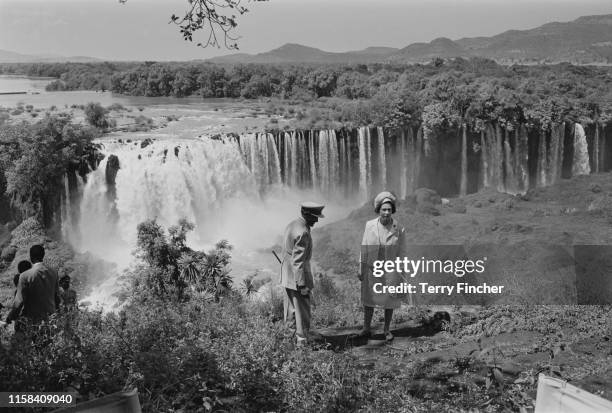 Queen Elizabeth II at the Tissisal Falls, where the Blue Nile begins, with Emperor Haile Selassie during a royal visit to Ethiopia, 7th February 1965.