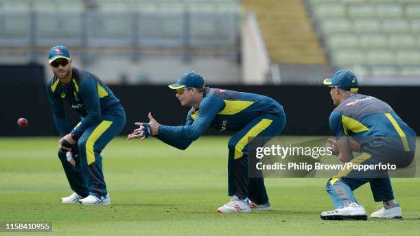 David Warner, Steve Smith and Cameron Bancroft of Australia during a training session before the first Specsavers Test Match between England and...