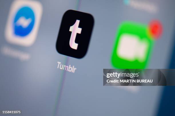 This illustration picture taken on July 24, 2019 in Paris shows the logo of the US social network application Tumblr on the screen of a tablet.